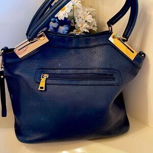 Black Rivet brand, blue leather purse from Wilsons Leather